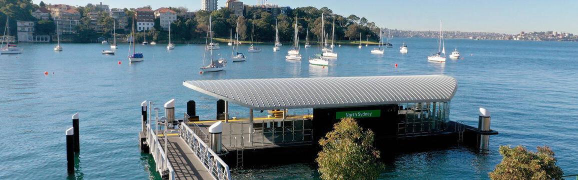 Woollahra Sailing Club wharf with boats on Sydney Harbour.