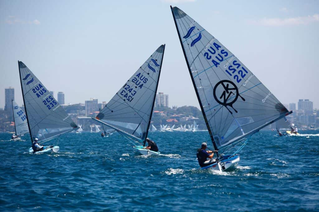 Sailboats racing at Woollahra Sailing Club in Sydney Harbour.