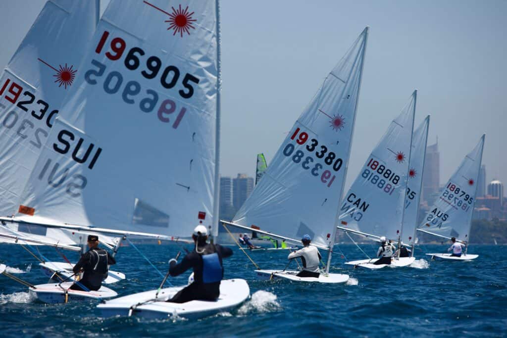 Sailboats racing at Woollahra Sailing Club in Sydney Harbour.