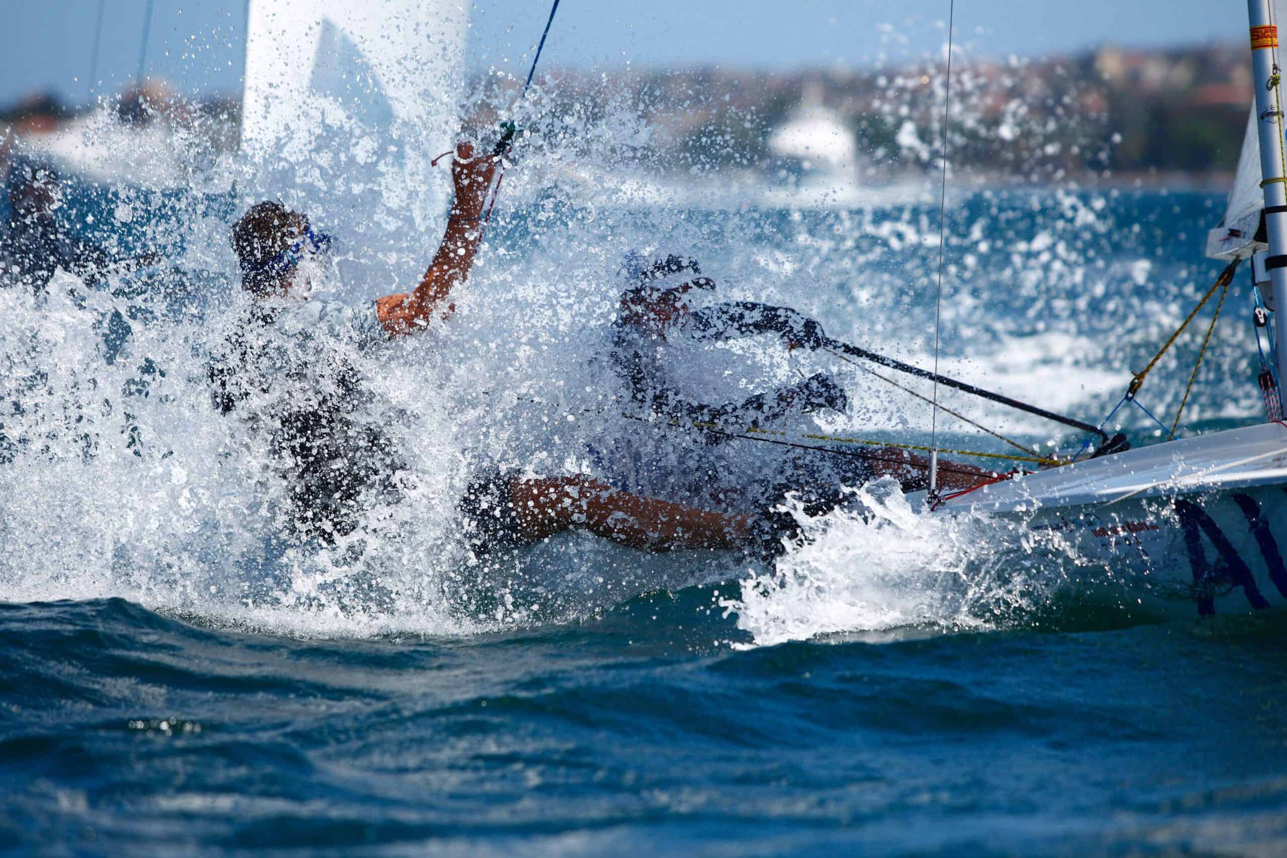 Sailors racing in a boat during a windy day at Woollahra Sailing Club.