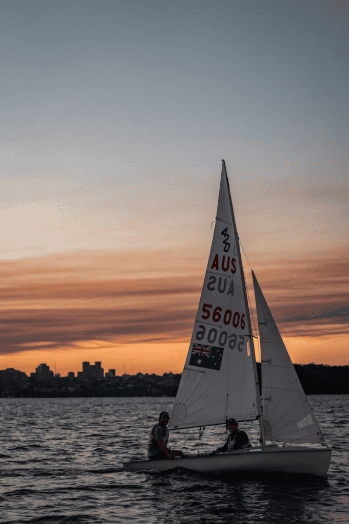 Pacer dinghy flying a spinnaker rigging track layout