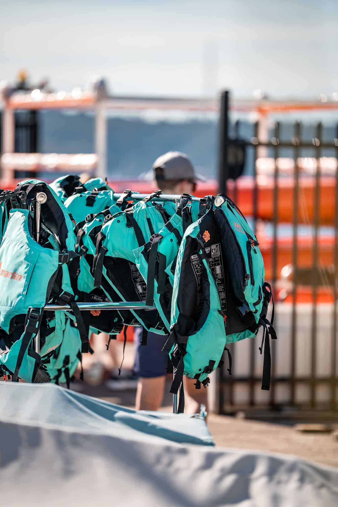 Sailing gear at Woollahra Sailing Club with boats in the background.