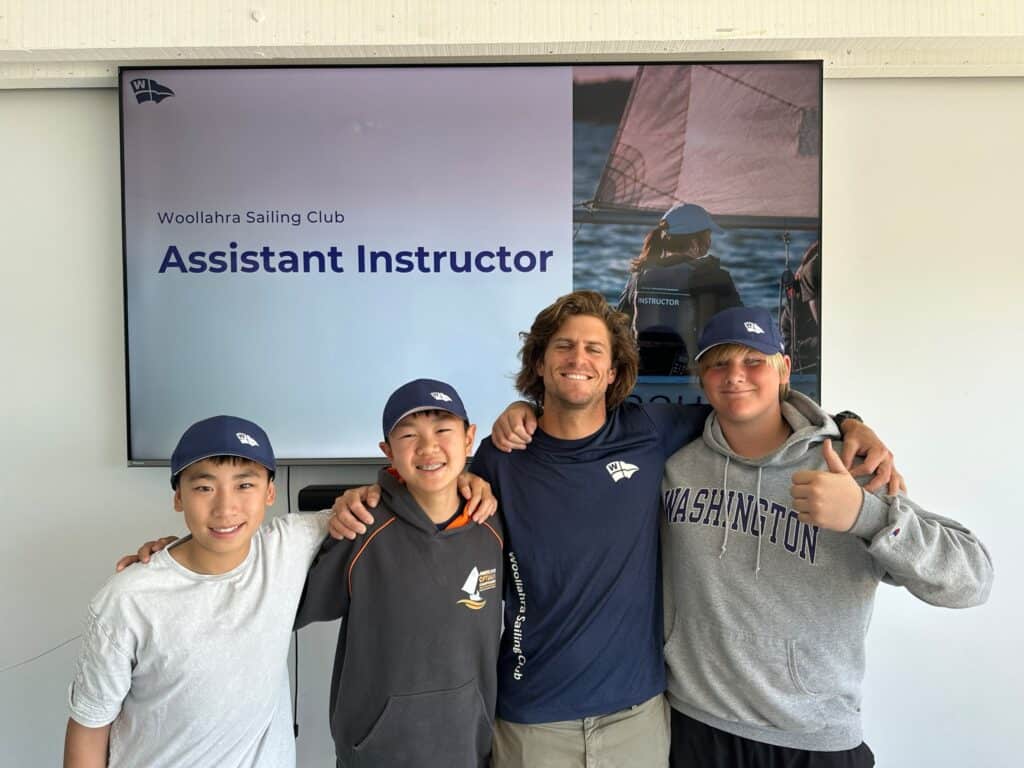 Group of young sailors with instructor at Woollahra Sailing Club.